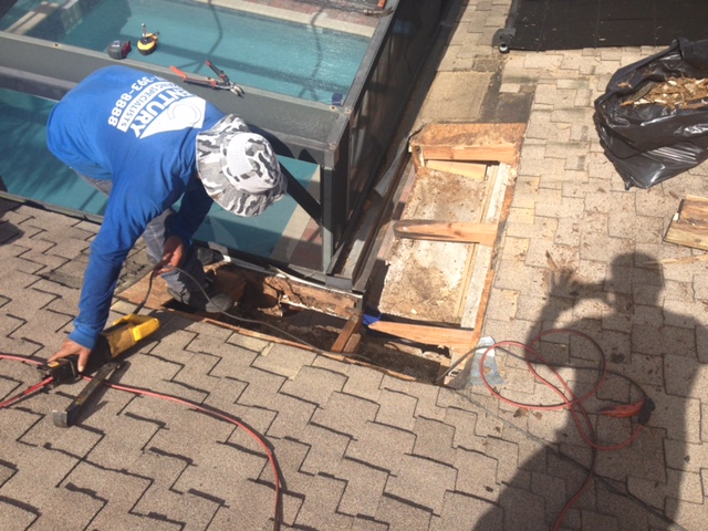 Century Roofing Specialist Team working on a roof repair